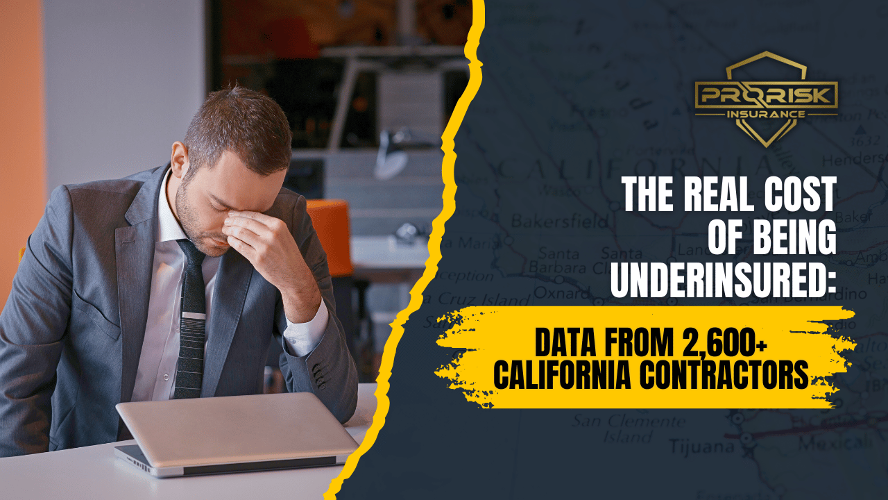 Stressed businessman in a suit sitting at a desk with a closed laptop, representing the financial impact of being underinsured, based on data from over 2,600 California contractors, from Pro Risk Insurance.